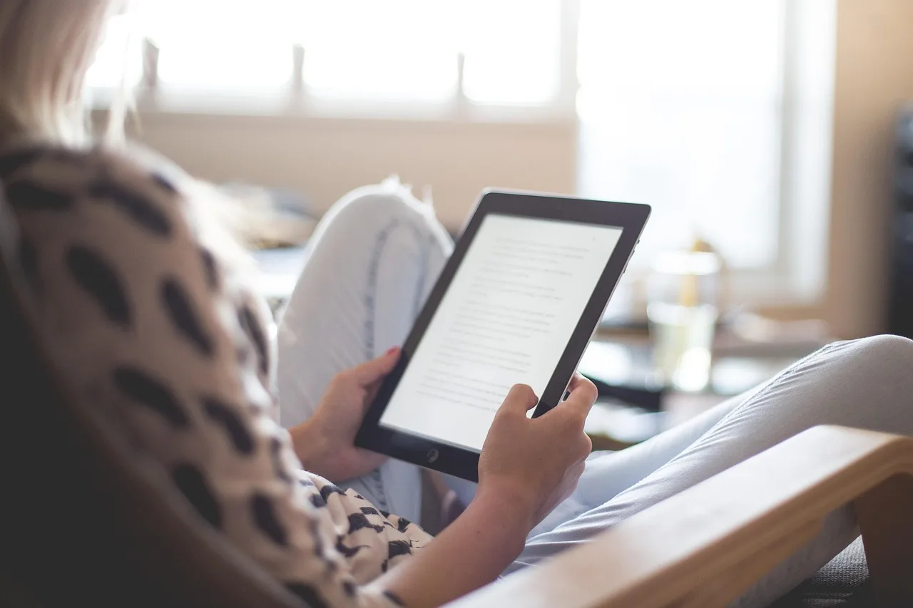 kindle, ereader, tablet, e-reader, ebook, e-book, adult, blur, chair, home, indoors, learning, leisure, living room, modern, reading, relaxing, sitting, technology, woman, kindle, tablet, ebook, ebook, ebook, learning, learning, learning, learning, reading, reading, reading, reading, reading. Ebook marketing practices: what respects readers and retailers