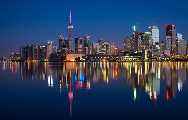buildings, cn tower, nature, river, waterfront, illuminated, city lights, cityscape, skyline, skyscrapers, architecture, reflection, water reflection, mirroring, canada, night, night photography, ontario, toronto, water, calm waters. How to plan Toronto Montreal Vancouver retention benchmarks